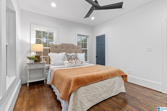 bedroom featuring dark wood-type flooring and ceiling fan