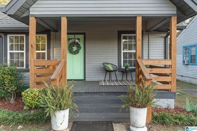 doorway to property with covered porch