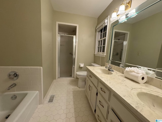 full bathroom featuring vanity, plus walk in shower, toilet, and tile patterned flooring