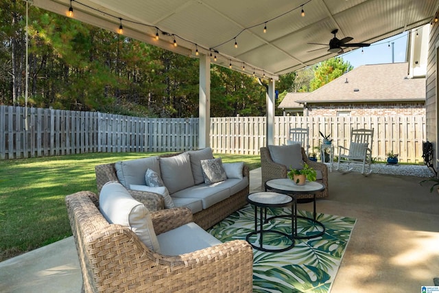 view of patio with an outdoor living space and ceiling fan