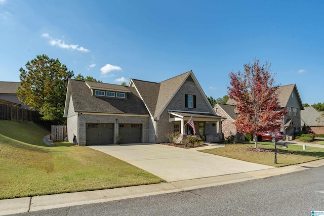 view of front facade with a front lawn and a garage