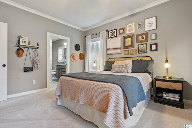 bedroom featuring connected bathroom, crown molding, and carpet