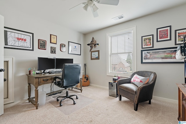 office area featuring light colored carpet and ceiling fan