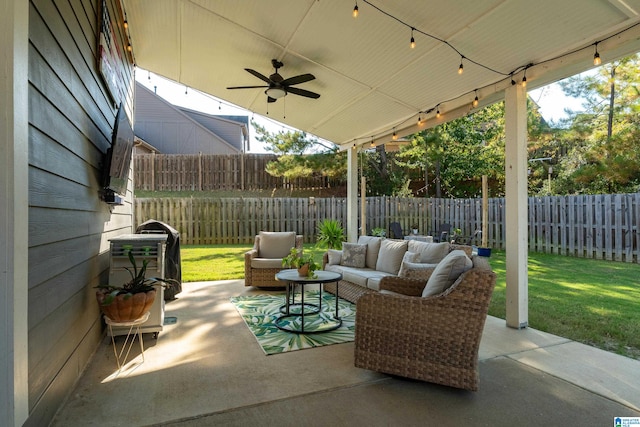 view of patio with ceiling fan and an outdoor living space