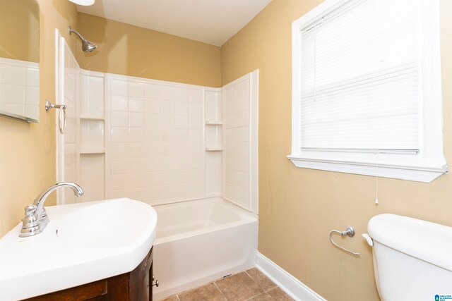 full bathroom with vanity, toilet, shower / bath combination, and tile patterned flooring