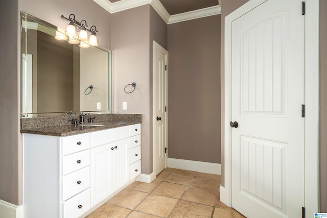 bathroom featuring vanity and ornamental molding