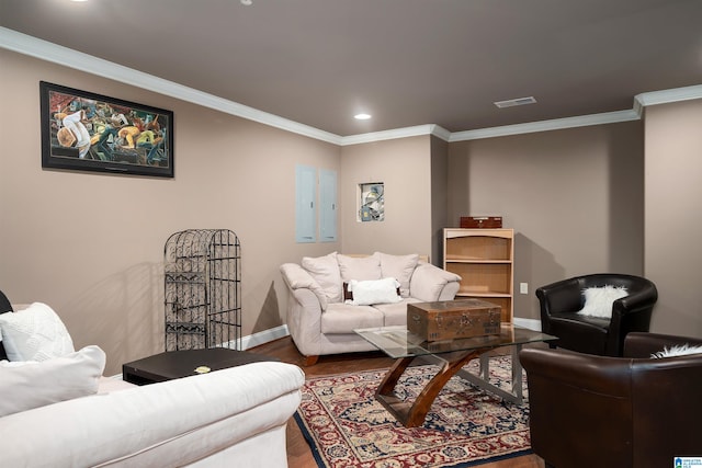 living room with crown molding and wood-type flooring