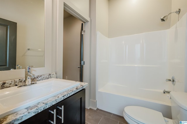 full bathroom with toilet, shower / bathing tub combination, vanity, and tile patterned floors