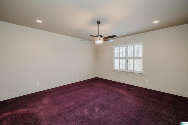 carpeted empty room with ceiling fan