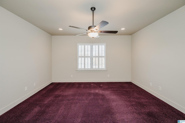 carpeted empty room featuring ceiling fan