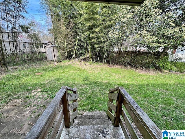 view of yard with a storage shed