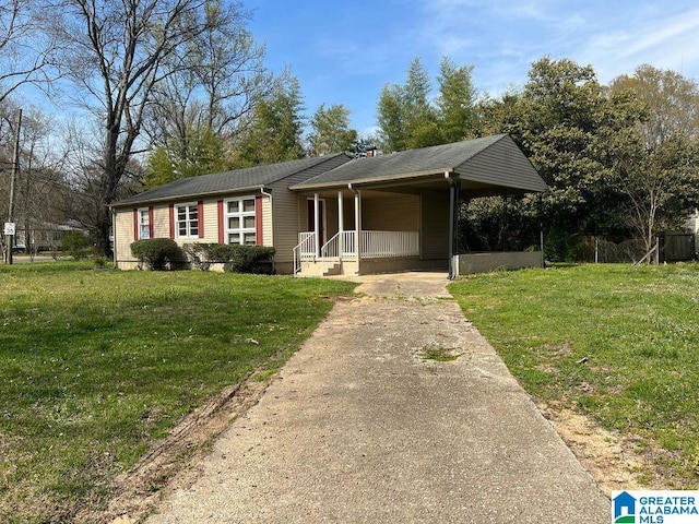 single story home featuring a carport and a front yard