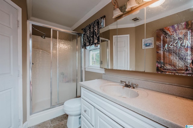 full bathroom with a stall shower, vanity, ornamental molding, and toilet