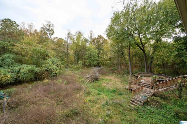 view of yard with a wooden deck