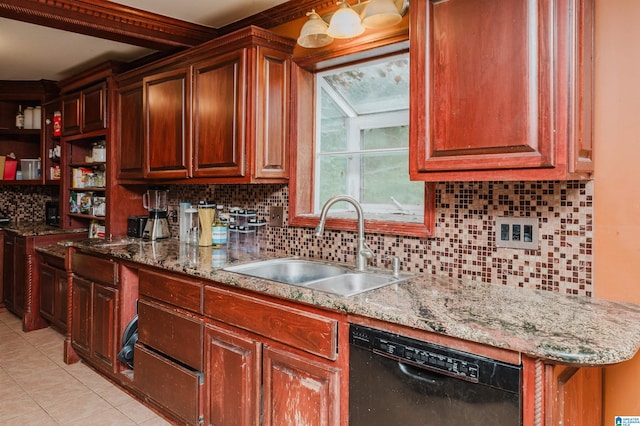 kitchen with black dishwasher, a sink, decorative backsplash, light tile patterned flooring, and light stone countertops