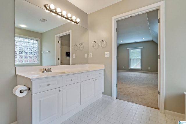 bathroom featuring tile patterned floors and vanity