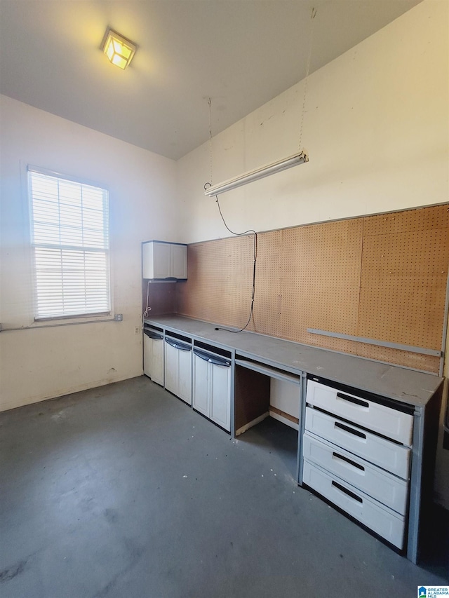 interior space featuring concrete floors