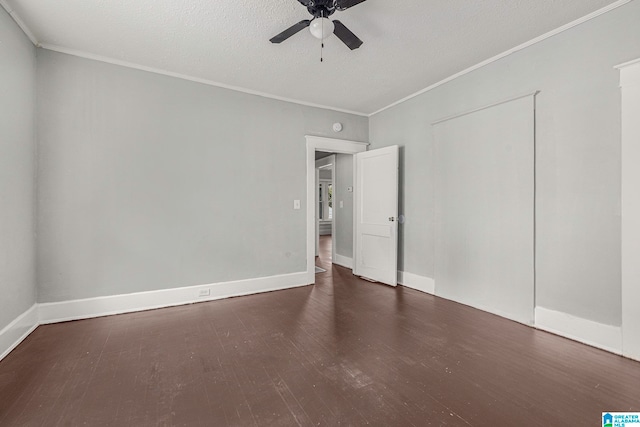 unfurnished bedroom with dark wood-type flooring, crown molding, a textured ceiling, and ceiling fan