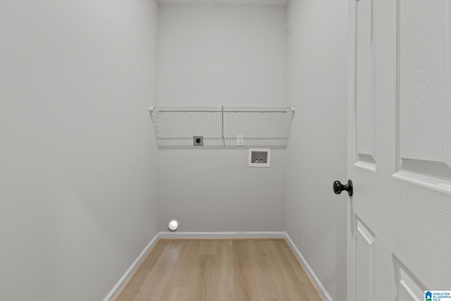 laundry room with washer hookup, light wood-type flooring, and electric dryer hookup