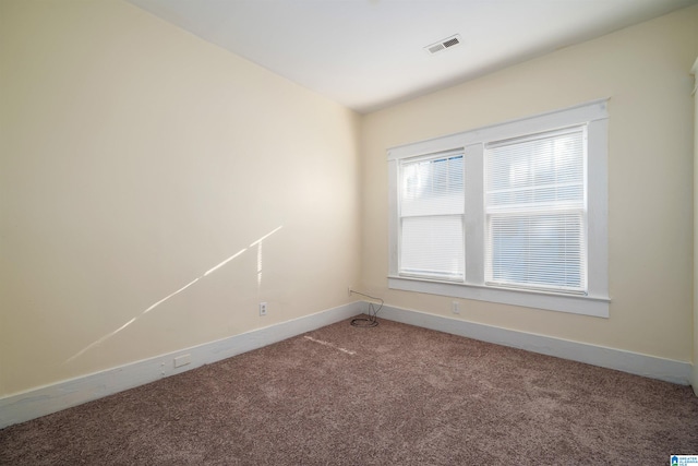 view of carpeted spare room