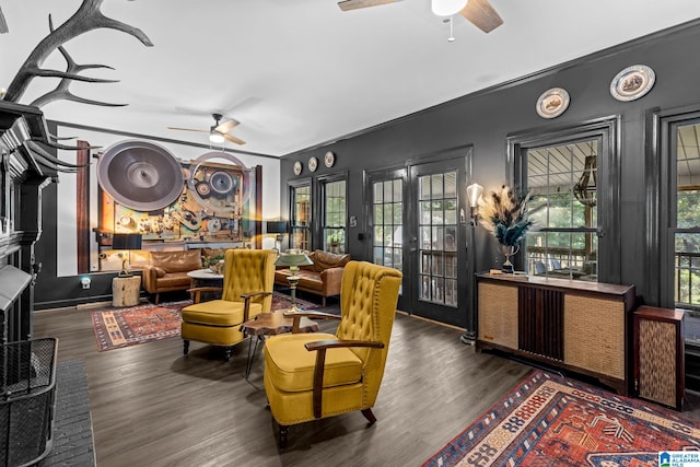 interior space featuring dark wood-type flooring, ceiling fan, and french doors