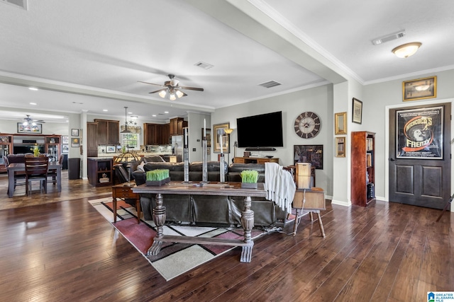 living room featuring ceiling fan, ornamental molding, and dark hardwood / wood-style floors