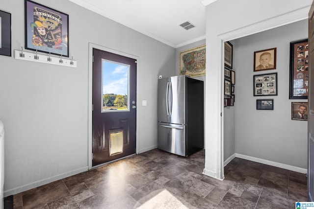 entryway featuring ornamental molding