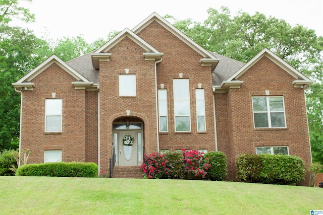 view of front of property with a front lawn