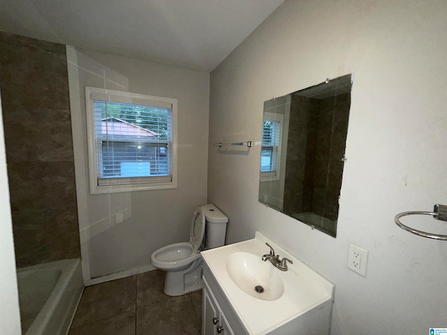 bathroom featuring toilet, vanity, and tile patterned floors