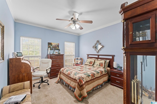 bedroom with ceiling fan, light carpet, and crown molding