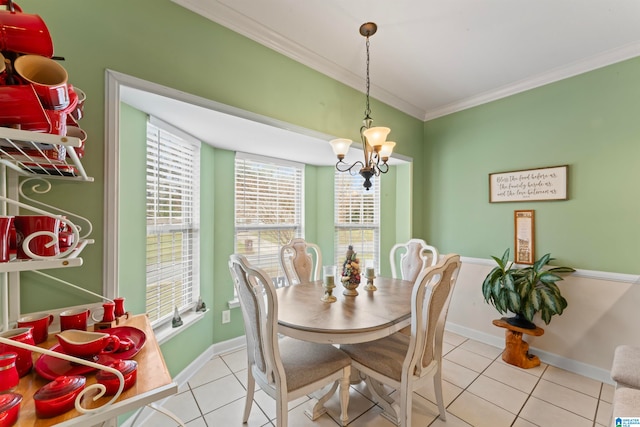 tiled dining area with a healthy amount of sunlight, a notable chandelier, and ornamental molding