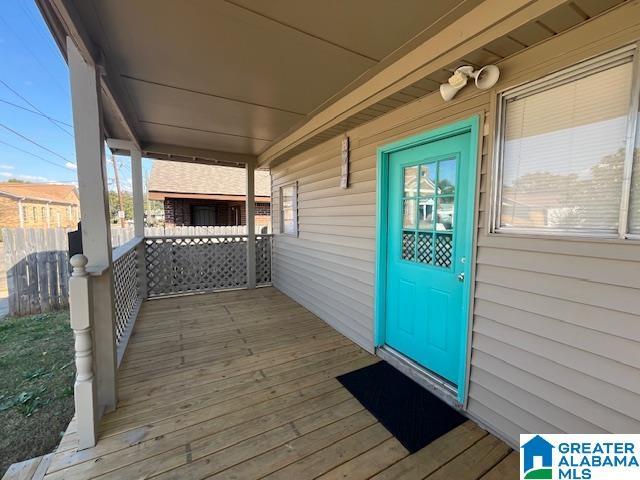 109 2nd Ave SW, Birmingham, AL 35211 - wooden terrace featuring a porch