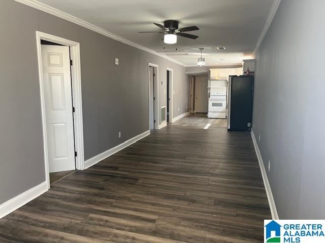 corridor with crown molding and dark wood-type flooring