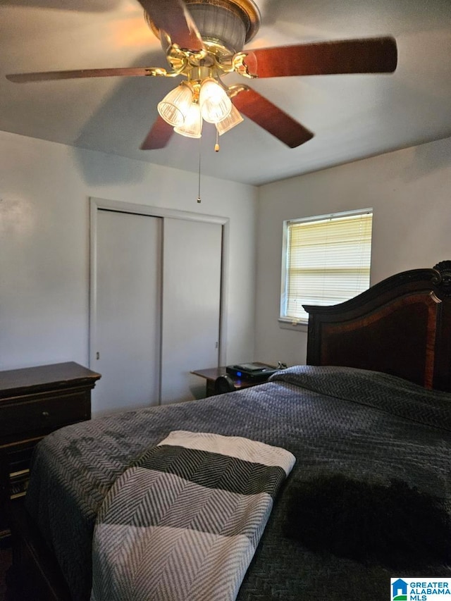 bedroom featuring a closet and ceiling fan