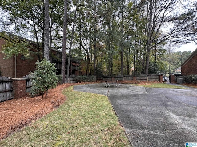 2082 Montreat Cir Unit 2082, Vestavia Hills, AL 35216 - view of yard featuring fence and central AC unit