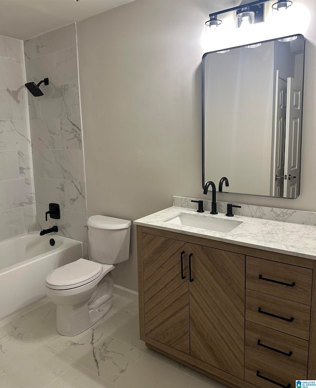 full bathroom with tiled shower / bath, vanity, and toilet