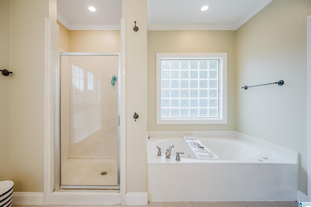 bathroom with separate shower and tub, tile patterned floors, and ornamental molding