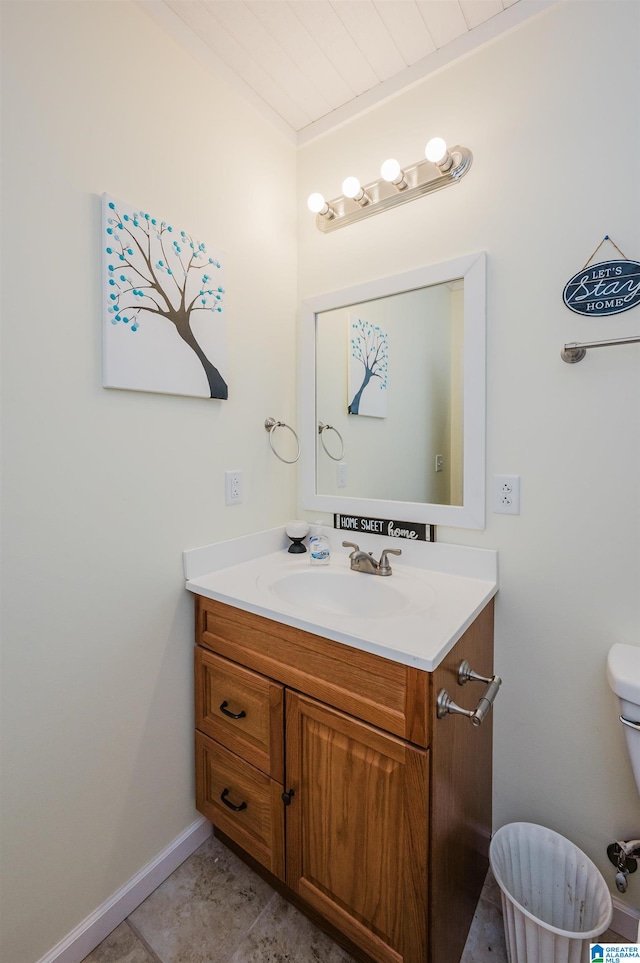 bathroom with vanity and toilet