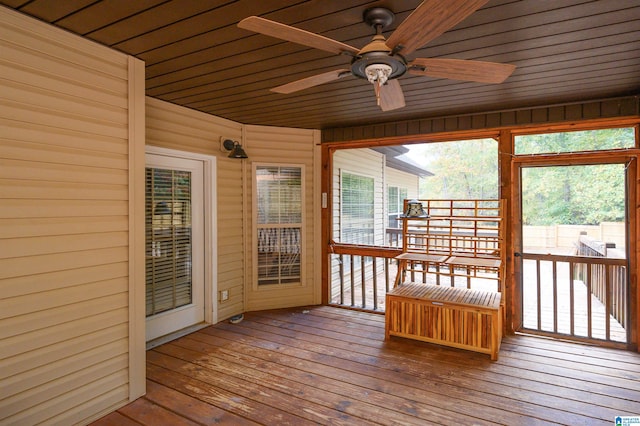 wooden deck with ceiling fan