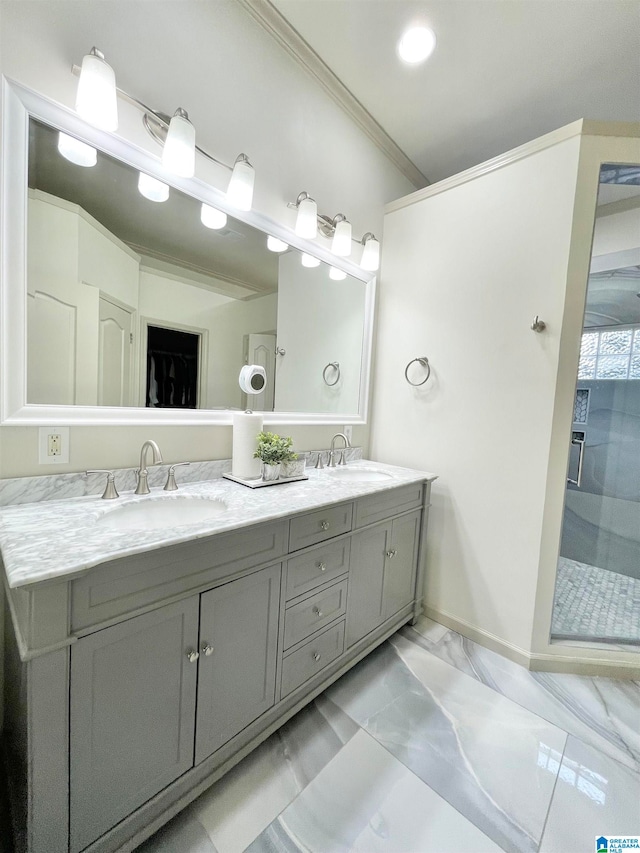 bathroom featuring vanity, crown molding, and a shower with door