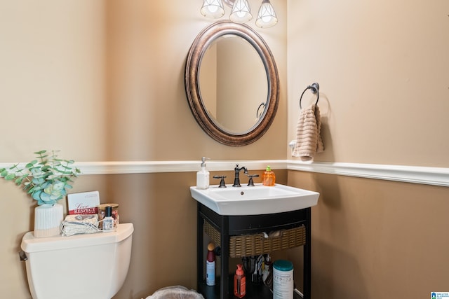 bathroom with vanity and toilet