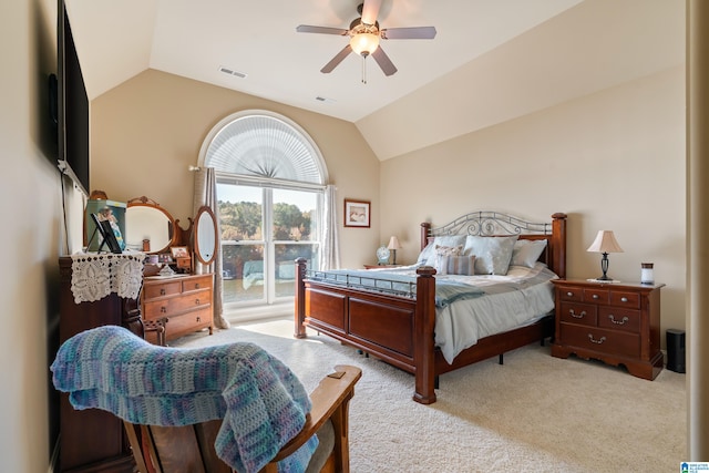 bedroom with ceiling fan, light carpet, and lofted ceiling