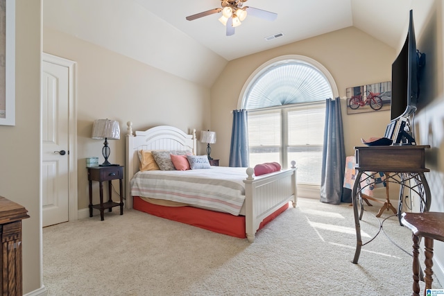 bedroom featuring lofted ceiling, carpet flooring, and ceiling fan