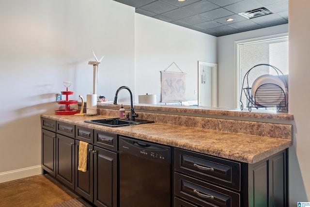 kitchen with sink, dishwasher, and kitchen peninsula