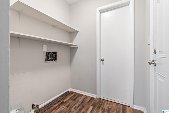 washroom featuring hookup for a washing machine and dark hardwood / wood-style floors