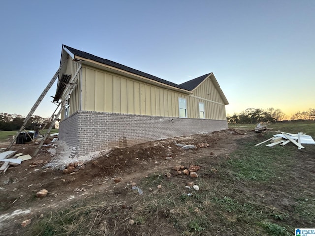 view of property exterior at dusk