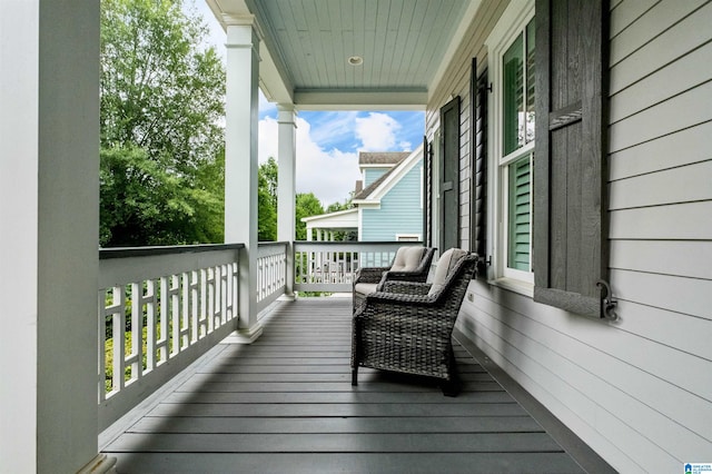 wooden terrace with covered porch