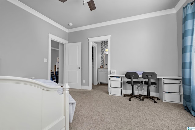 bedroom with ceiling fan, crown molding, and light colored carpet