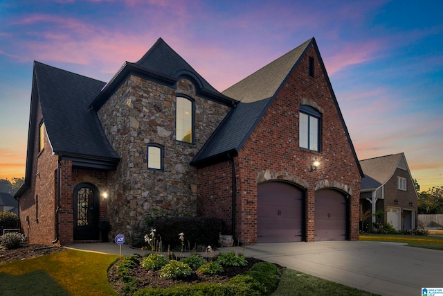 view of front of property with a garage