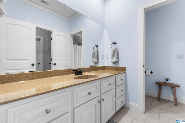 bathroom featuring vanity and tile patterned flooring